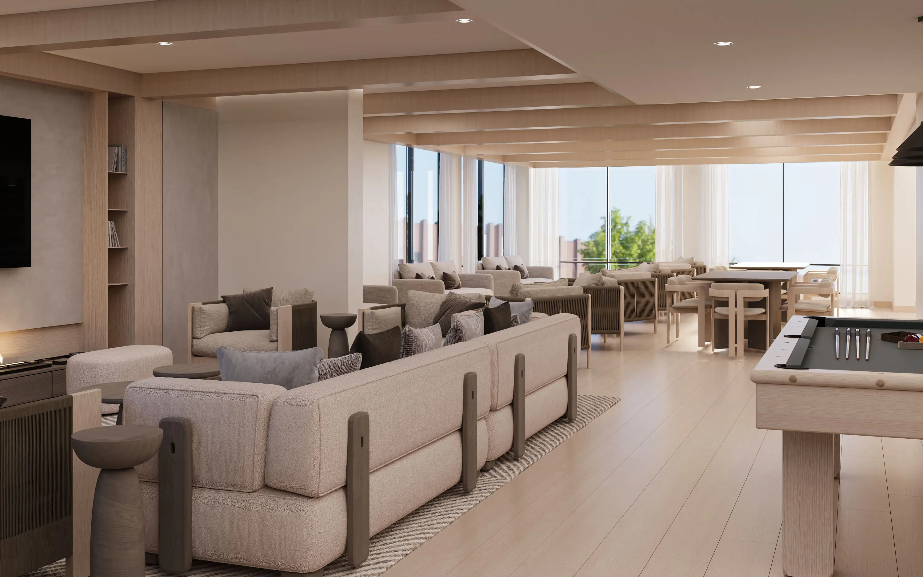 Resident lounge featuring seating areas and a billiard table